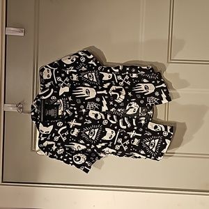 Spencer's, size small shirt, black and white, magical print.